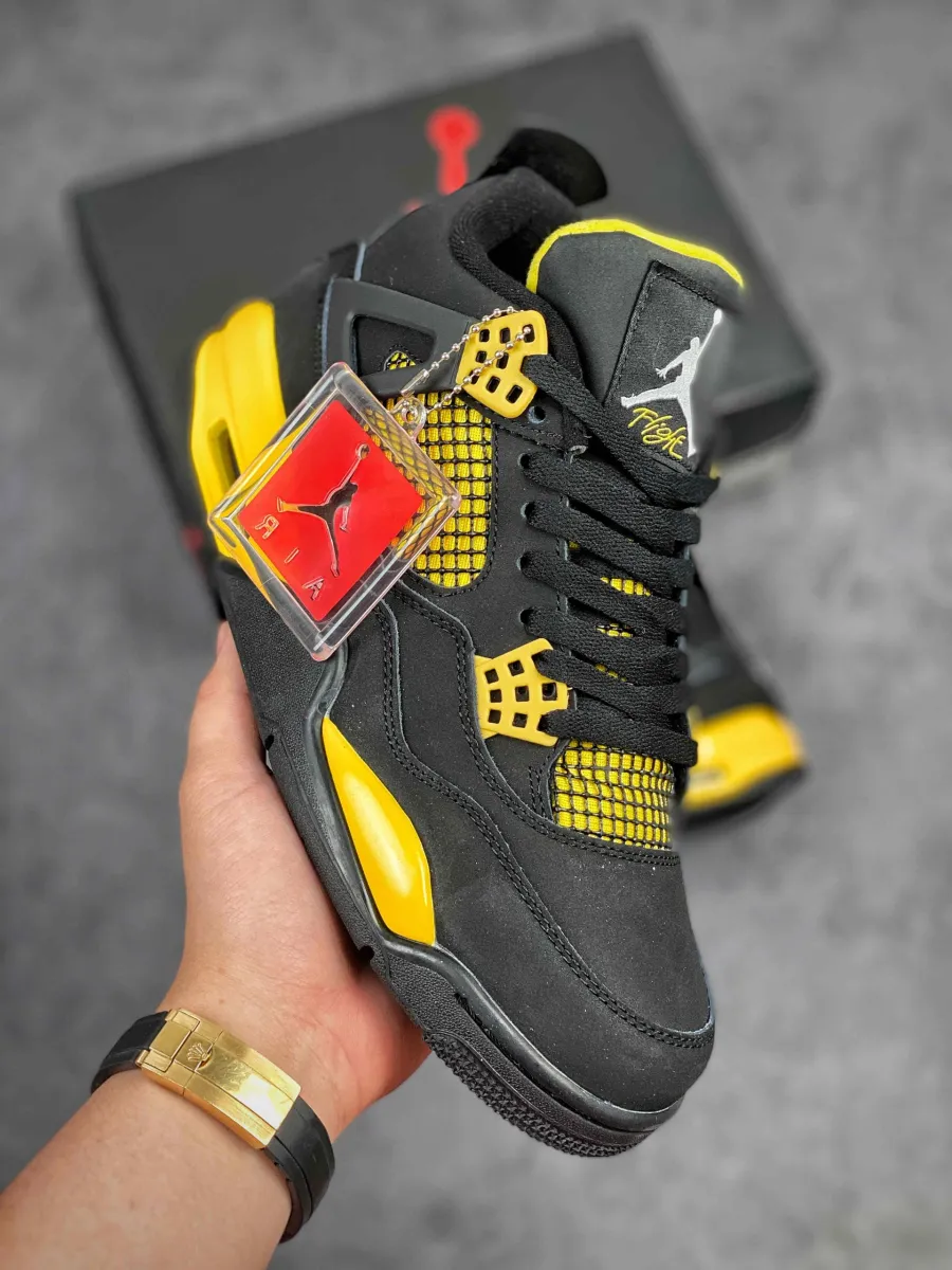 Air Jordan 4 'Thunder' Black/Tour Yellow yellow jordan retro 4